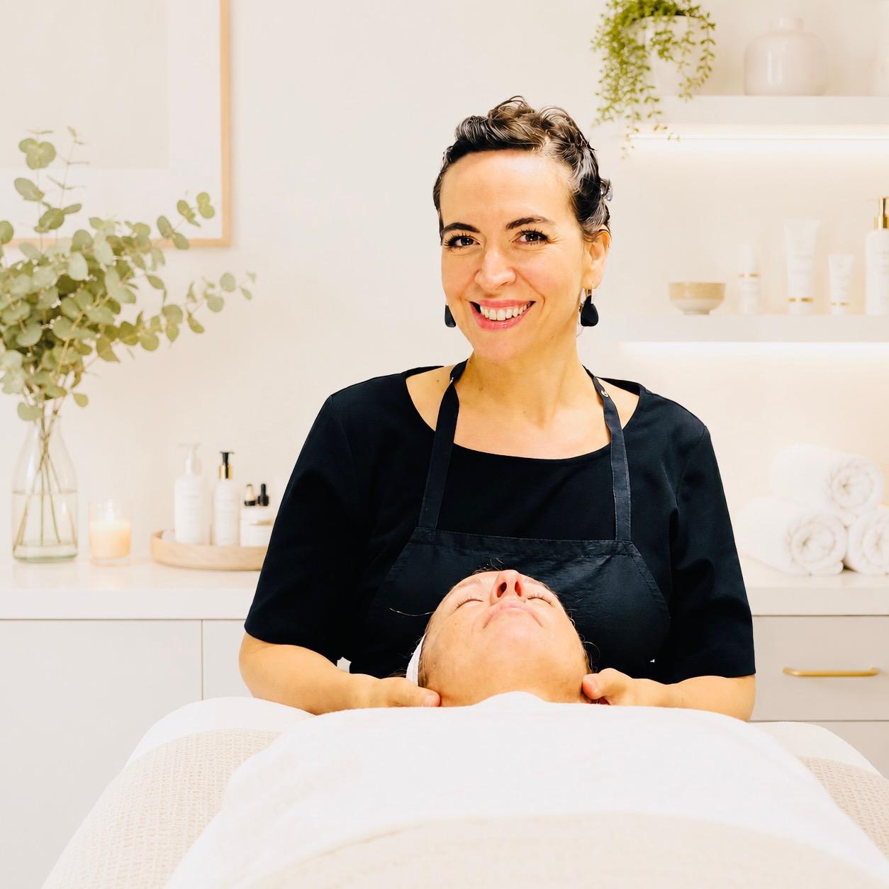 Leslie treating a client at Leslie's Skin Technique Studio